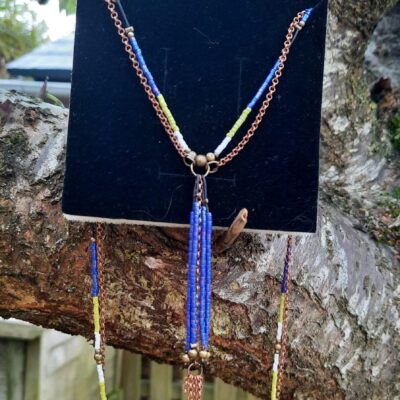 Sautoir d'inspiration Amérindienne, sautoir "Karan", double rang, perles "miyuki" et chaîne cuivre, pendentif pompon perles et chaîne cuivre