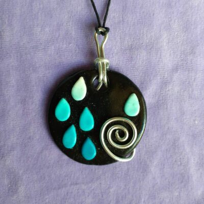 pendentif rond : "Jour de pluie"
