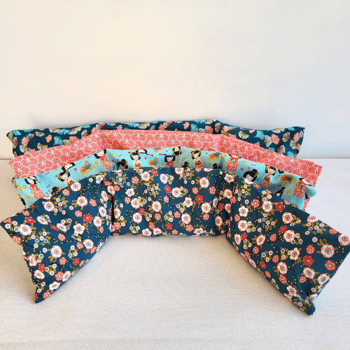 bouillotte sèche cervicale déhoussable idéale pour les douleurs de cou et d'épaule , s'utilise chaude ou froide