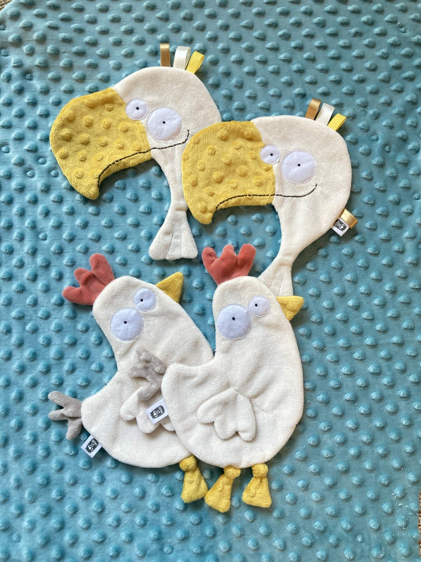doudou plat perroquet poulette