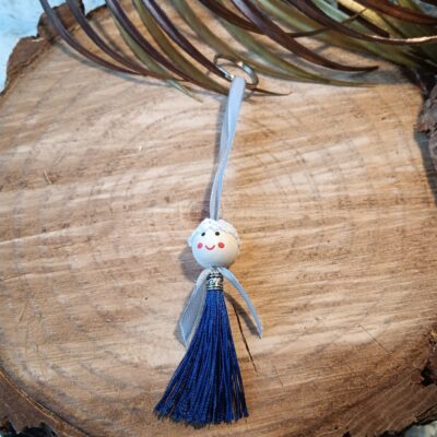 Porte clef / bijou de sac pompon bleu marine