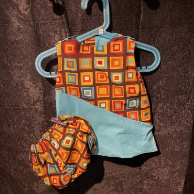 Robe réversible bleu et carreaux colorés 6 mois