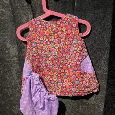 Robe réversible violet à pois et fleurs fuchsia 12 mois