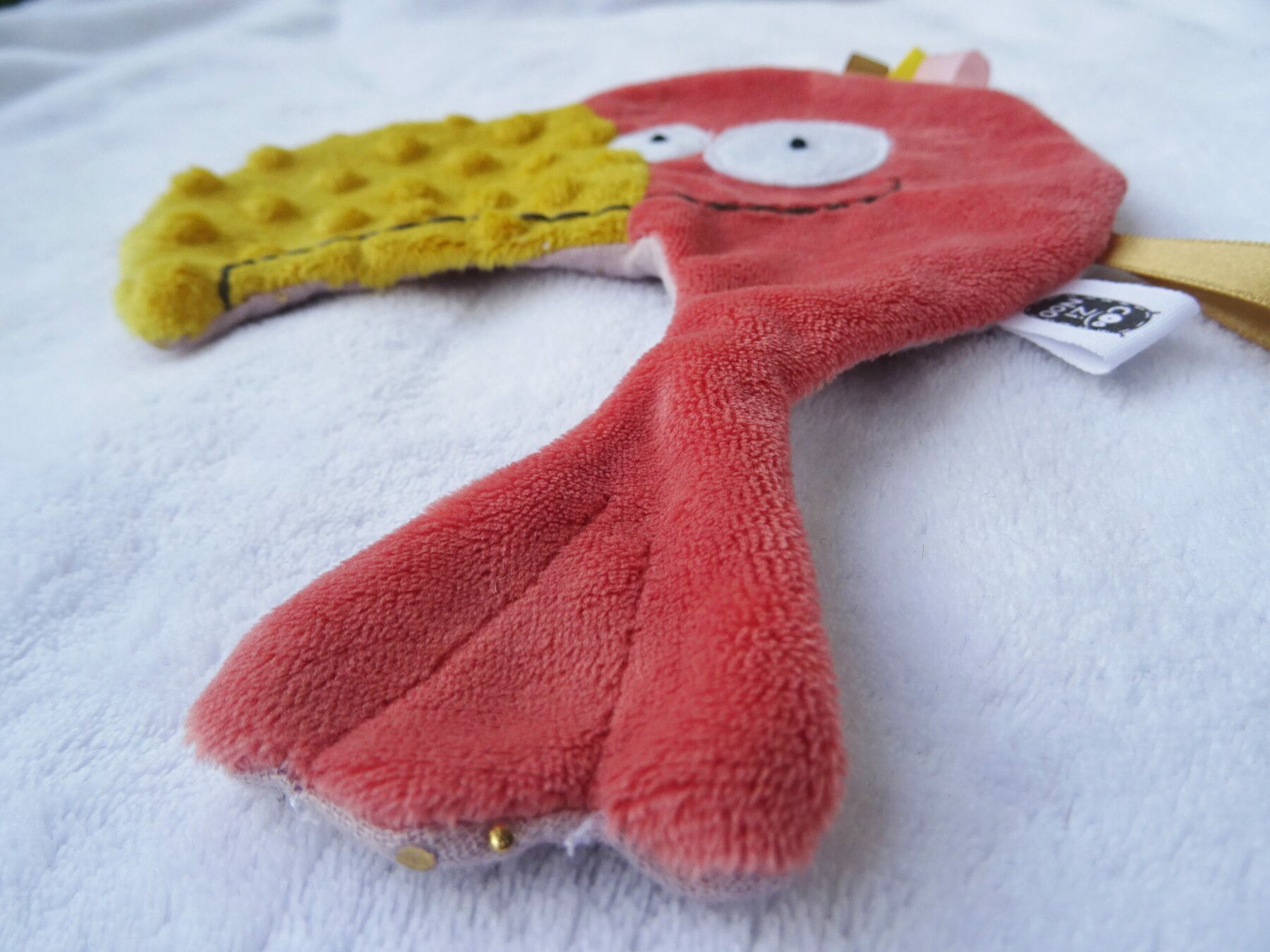 doudou plat étiquette perroquet