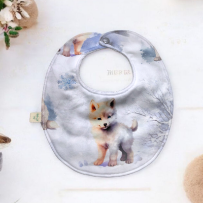 Bavoir bébé motif loup sur fond neigeux – fait main en coton premium et éponge de bambou Oeko-Tex®