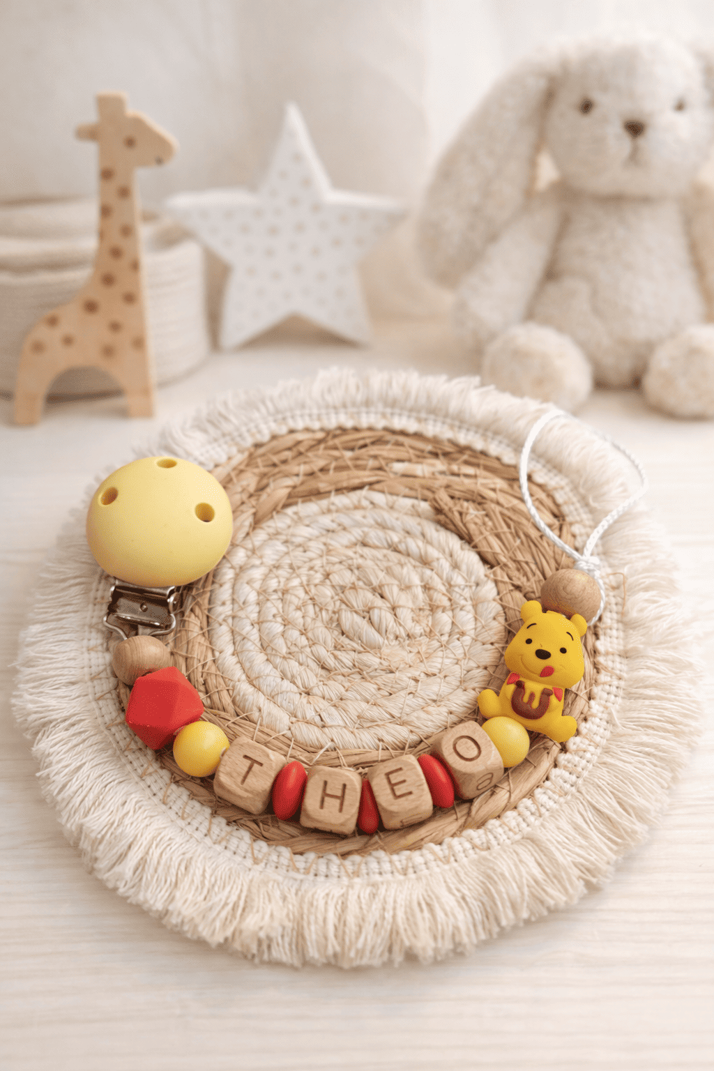 attache tétine winnie l'ourson