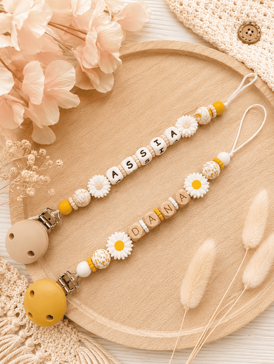 attache tétine marguerites